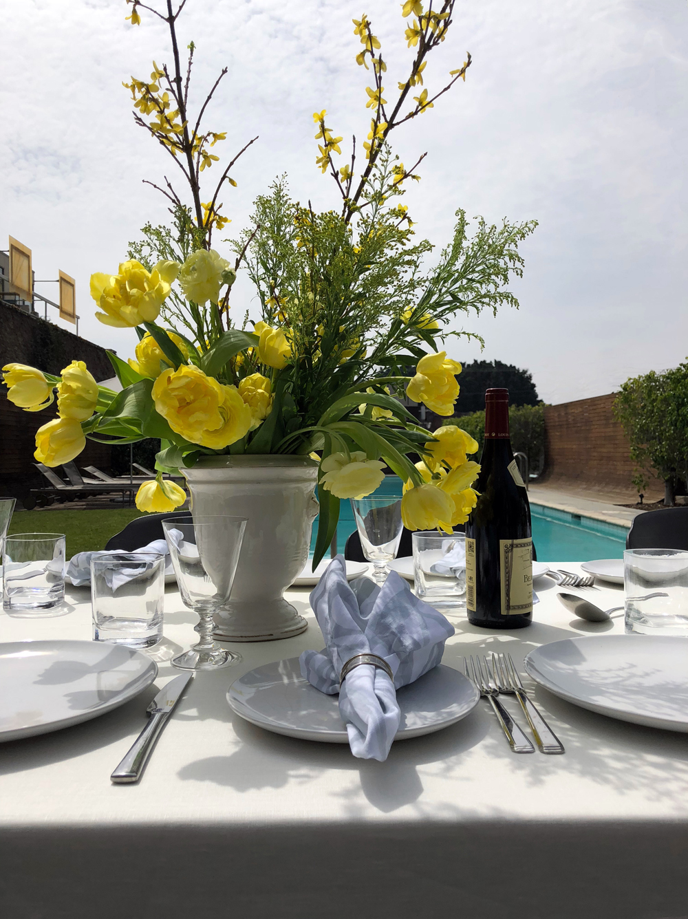 Poolside Spring Lunch Ivory Linen Tablecloth & Aqua and White Printed Linen Napkins from Huddleson